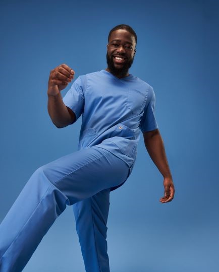 A carer wears an outfit in azure blue.