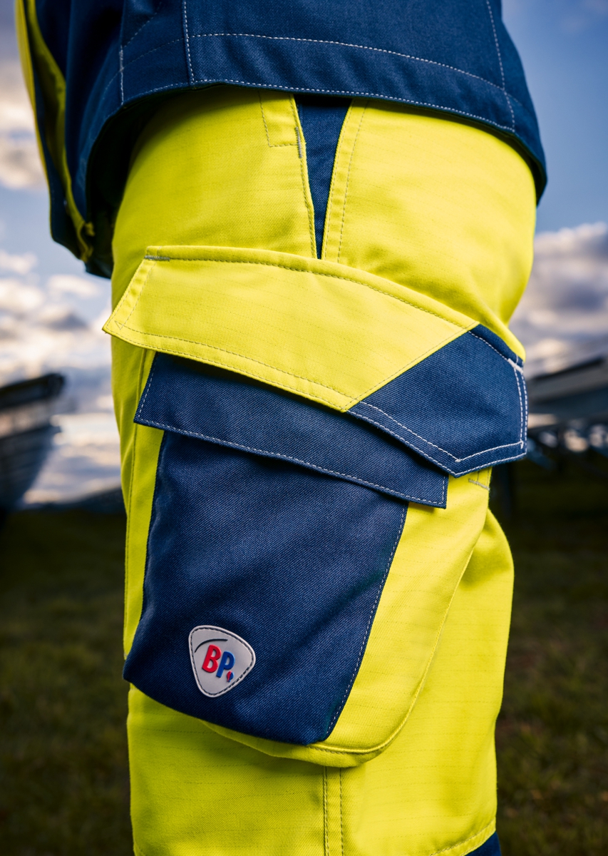 2216-590-6614 BP® Women's lightw. multi-standard high visibility APC1 trousers warning yellow/night blue Thumbnail 5